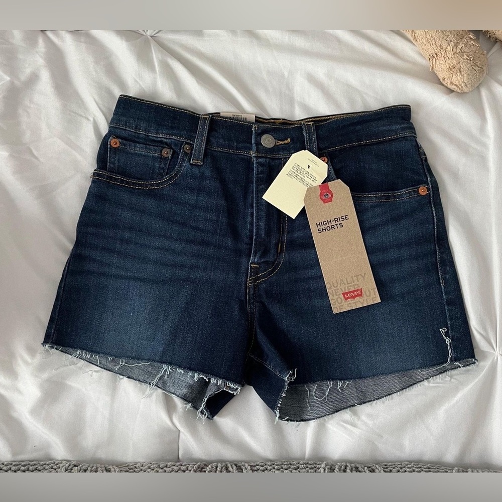 Levi’s, dark blue denim shorts. Comfy and flattering!